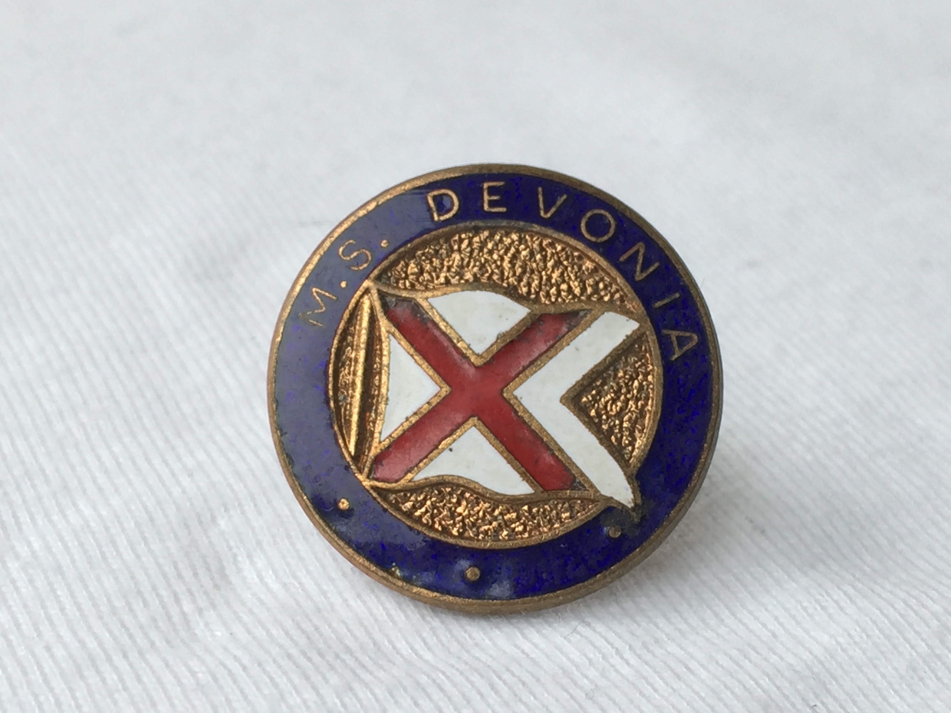 LAPEL PIN BADGE FROM THE BRITISH INDIA STEAM NAVIGATION COMPANY LINE VESSEL THE MS DEVONIA 1938-1967