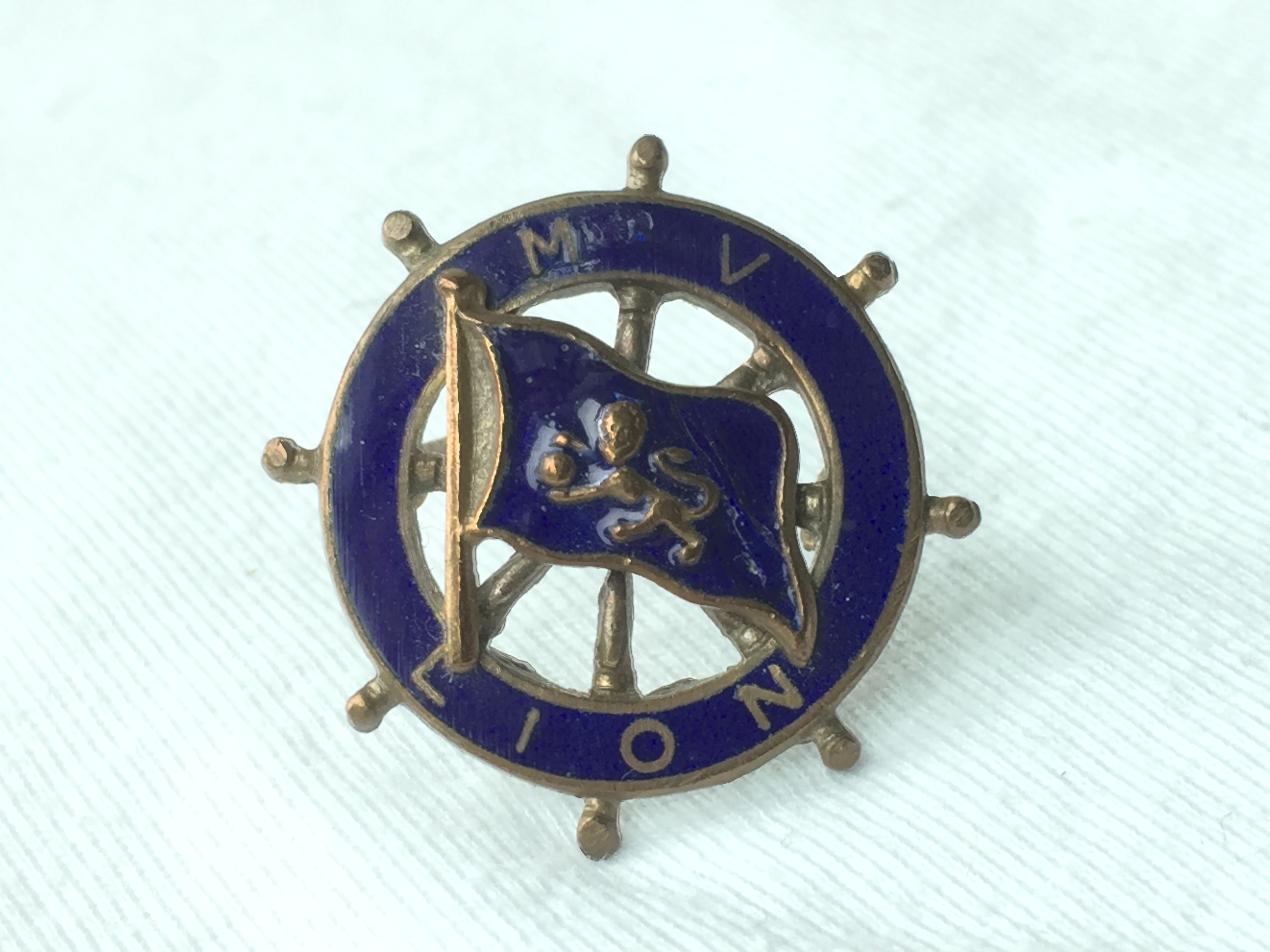 LAPEL PIN BADGE FROM THE BURNS AND LAIRDS LINE VESSEL THE MV LION
