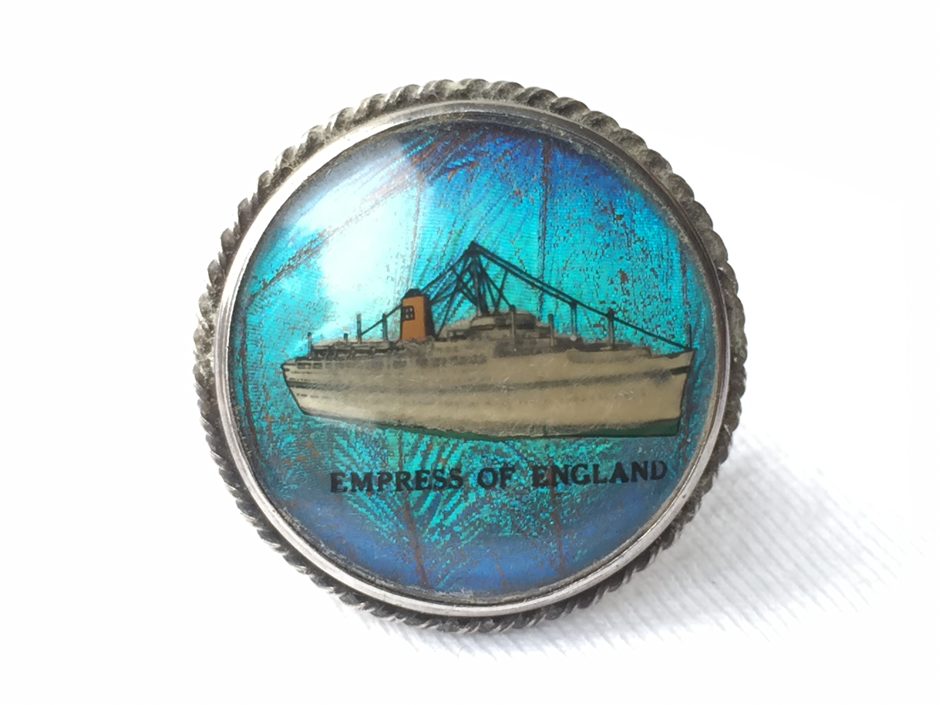 LAPEL PIN BADGE FROM THE CANADIAN PACIFIC LINE VESSEL THE EMPRESS OF ENGLAND 1956-1970