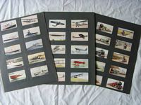 SET OF ORIGINAL 1940's CIGARETTE CARDS SHOWING BOATS, PLANES, TRAINS AND CARS