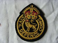 UNIFORM BADGE FROM THE CIVIL DEFENCE CORPS