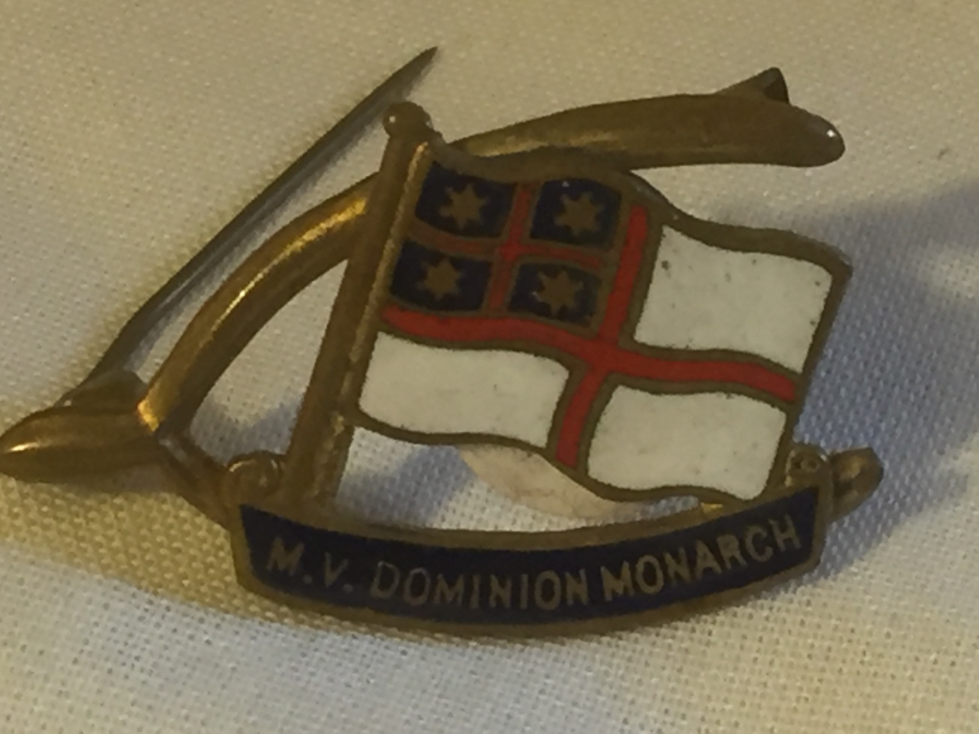 EARLY LAPEL PIN BADGE FROM THE DOMINION MONARCH A UK PASSENGER VESSEL