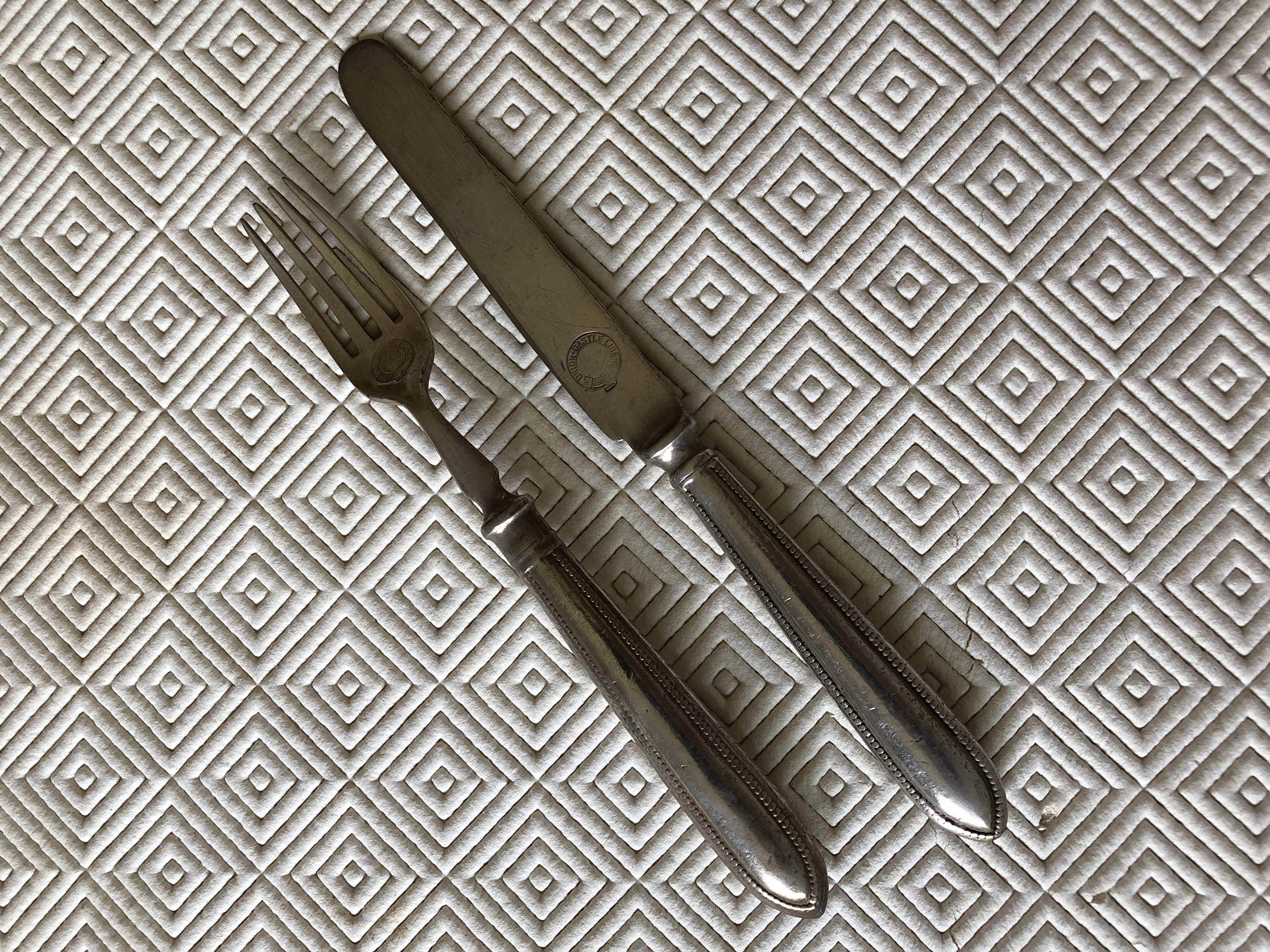 AS USED IN SERVICE SHIPS DINING KNIFE AND FORK FROM THE UNION CASTLE LINE