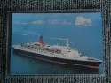 UNUSED COLOUR POSTCARD FROM THE CUNARD LINE VESSEL THE QE2