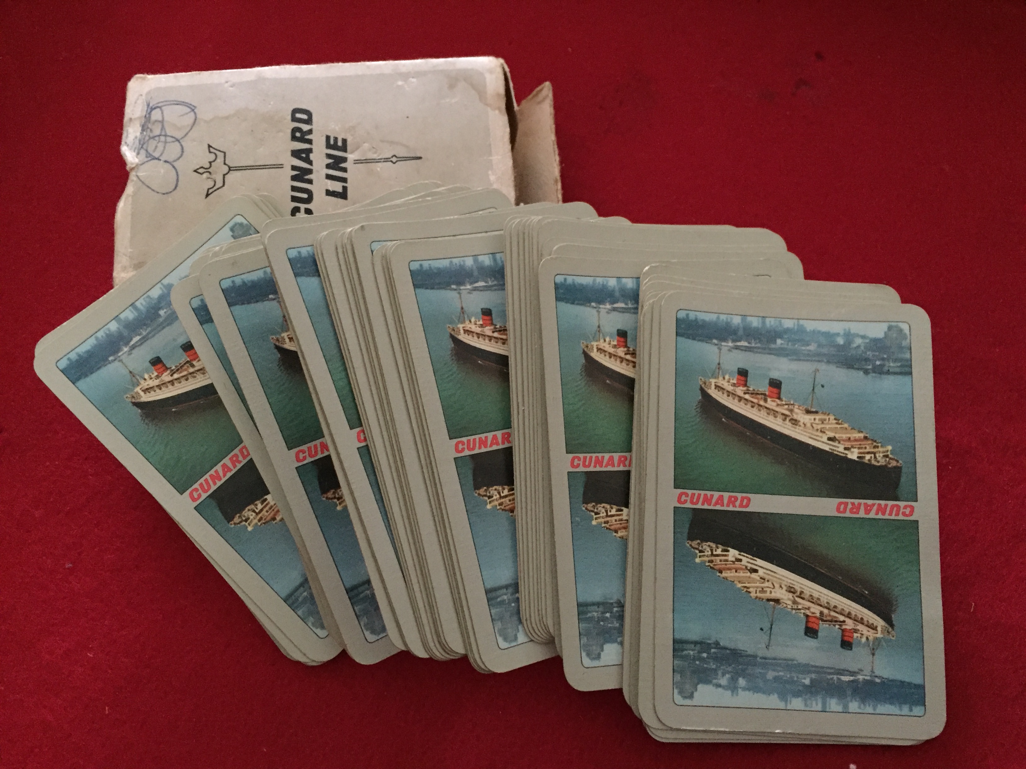 EARLY SOUVENIR SET OF PLAYING CARDS FROM THE ORIGINAL CUNARD LINE VESSEL THE QUEEN ELIZABETH 