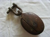 AS USED ONBOARD VERY OLD ROPE PULLEY AND EYE