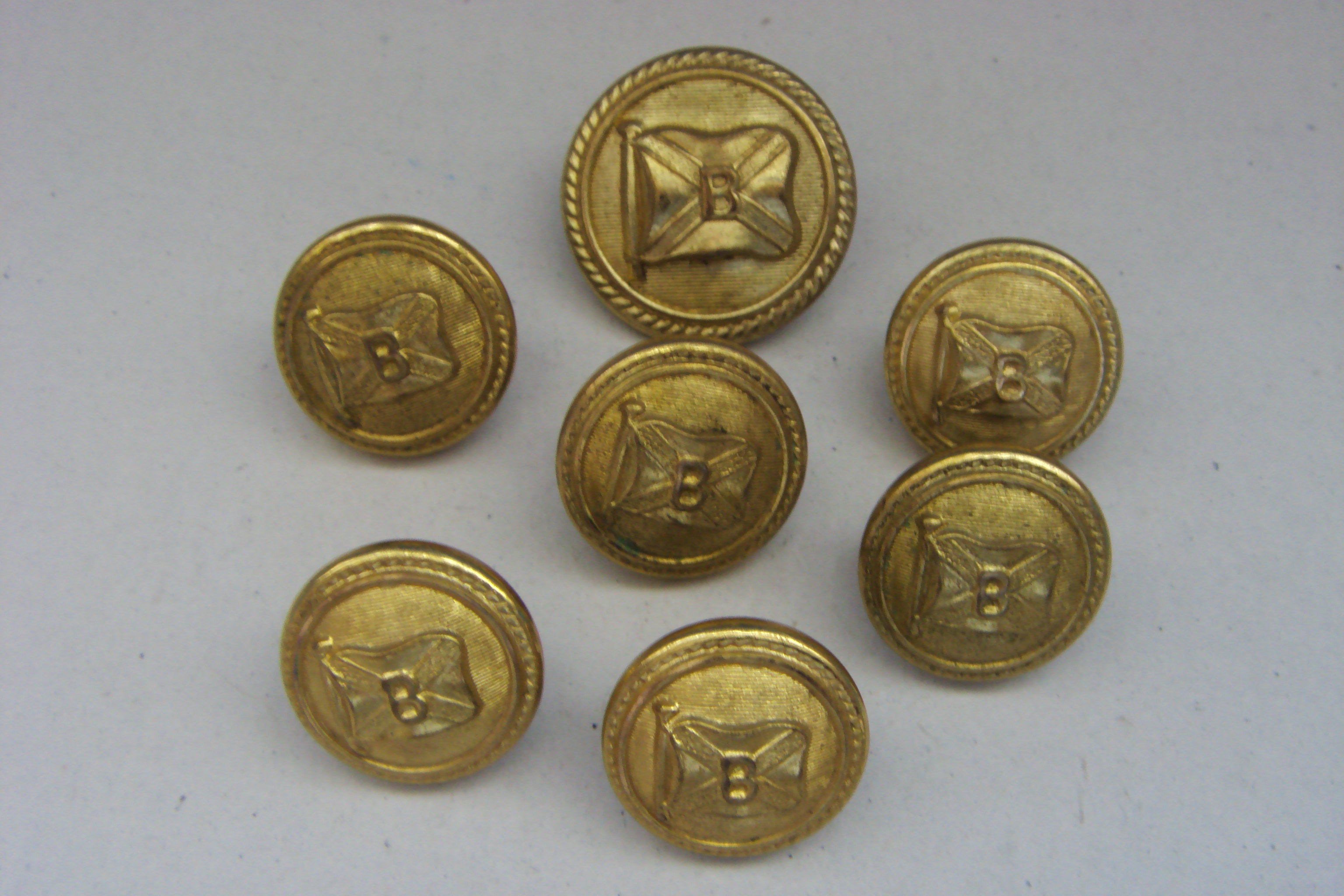 ASSORTED SIZE COLLECTION OF GOLD COLOURED OFFICERS COAT BUTTONS FROM THE BOOTH STEAMSHIP LINE CIRCA 1930's