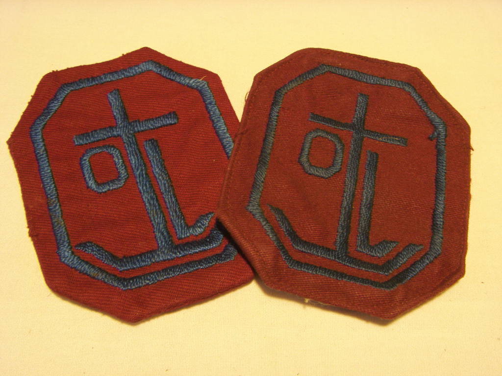 PAIR OF ORIGINAL DESIGN JACKET BADGES FROM THE ORIENT LINE