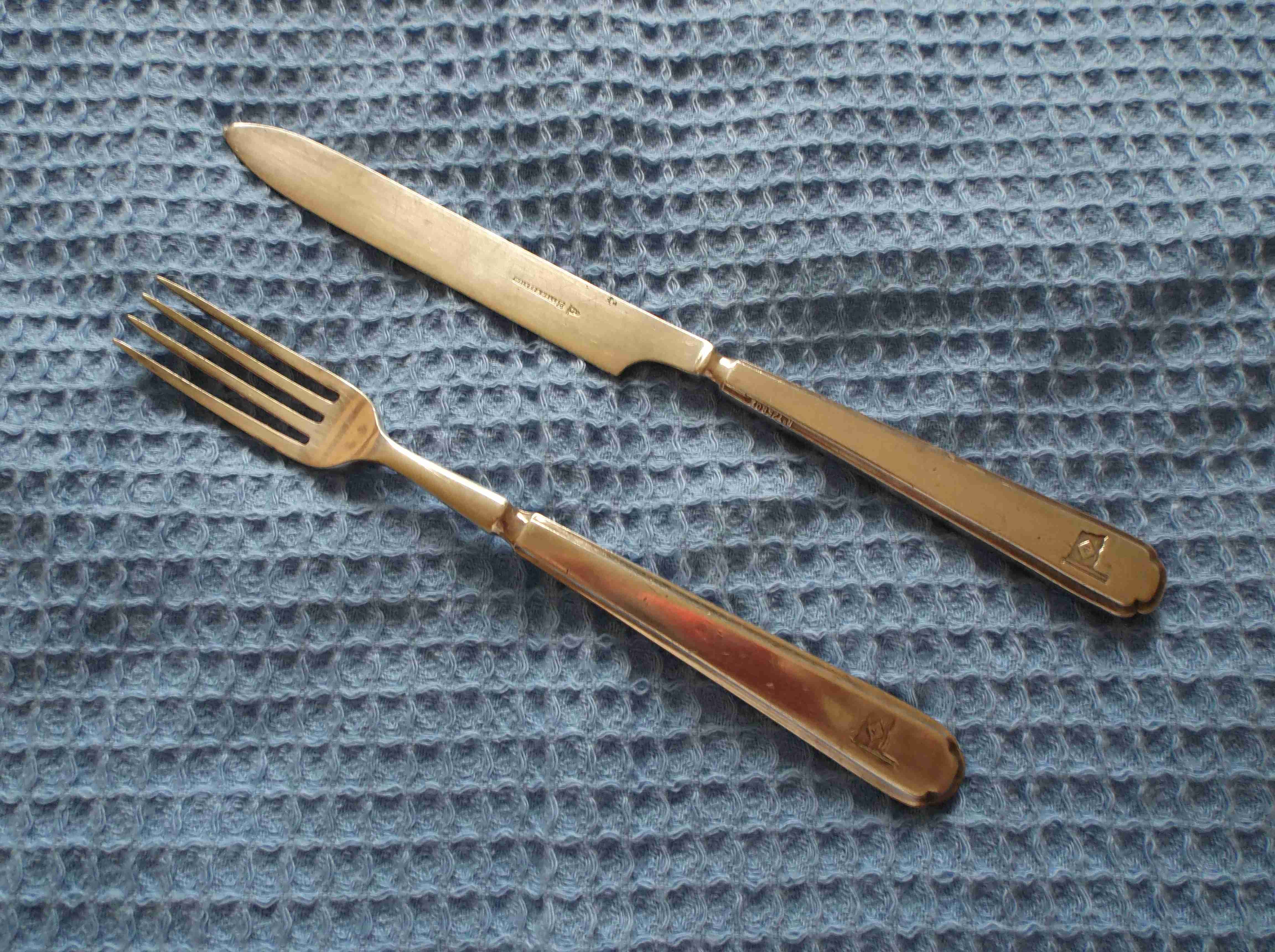 AS USED IN SERVICE SHIPS DINING KNIFE AND FORK FROM THE BLUE FUNNEL LINE
