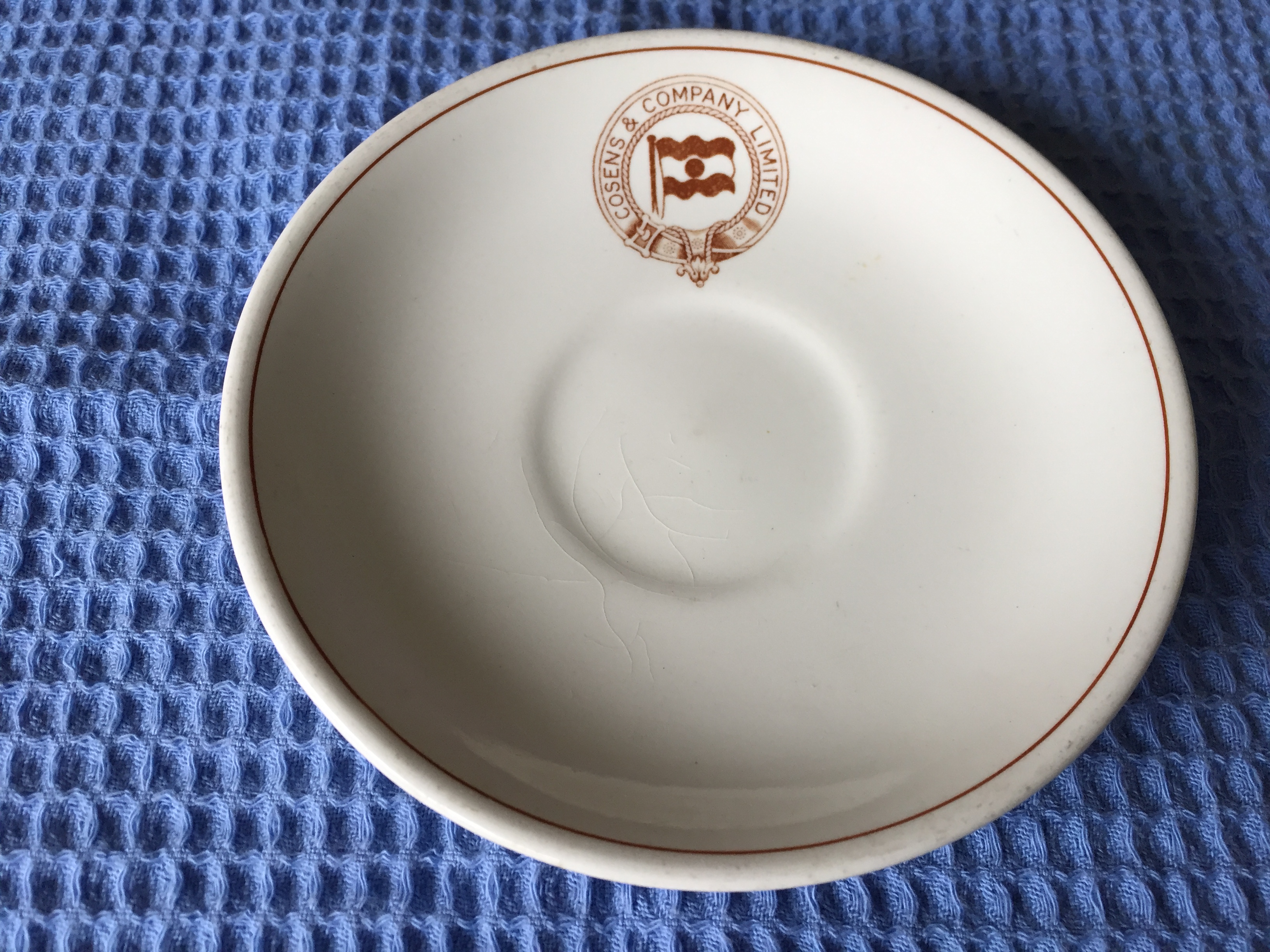 AS USED IN SERVICE CHINA SAUCER FROM THE COSENS SHIPPING COMPANY