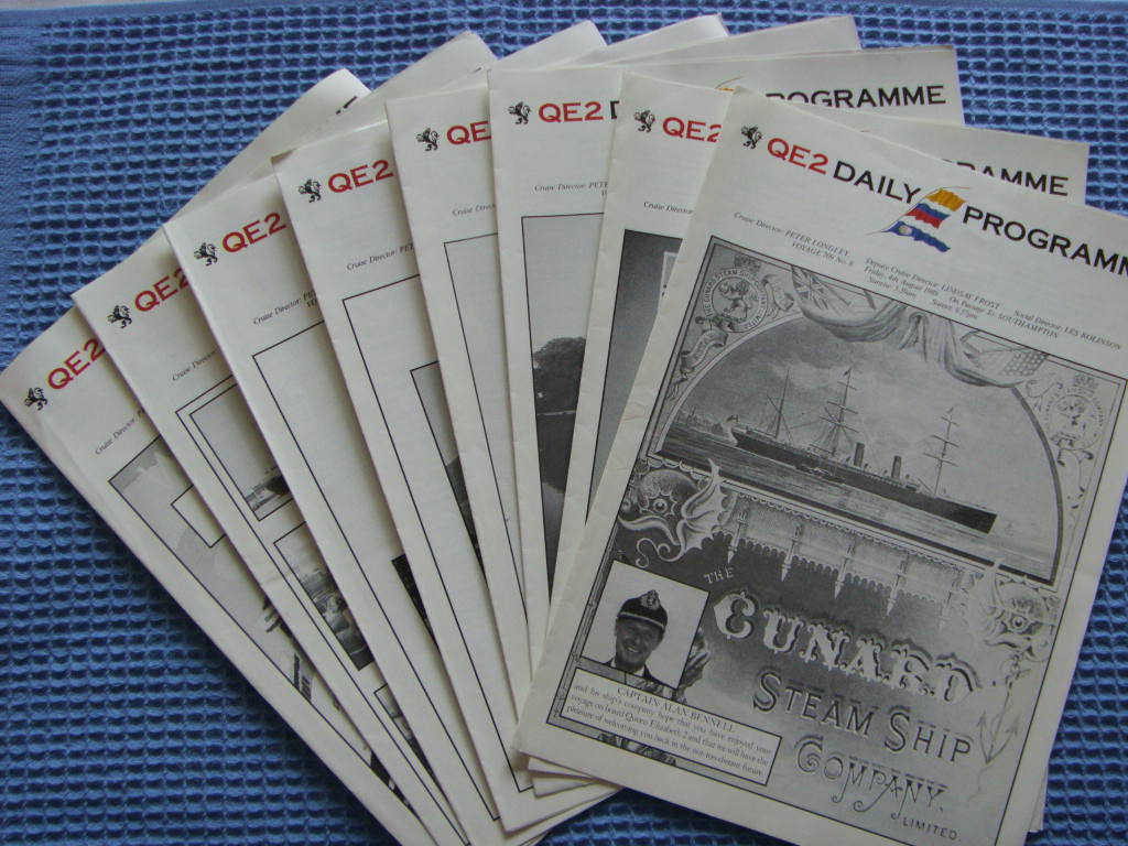 SET OF 8 DAILY CRUISE ACTIVITY PROGRAMS FROM THE QE2 DATED 1989