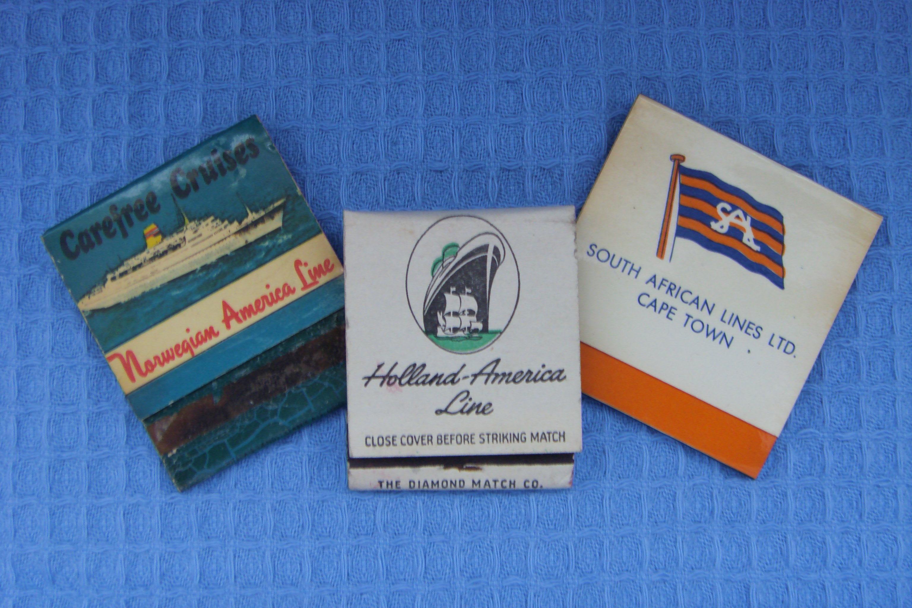 THREE VERY OLD BOOKS OF CIGARETTE MATCHES FROM VARIOUS OLD SHIPPING LINE COMPANIES