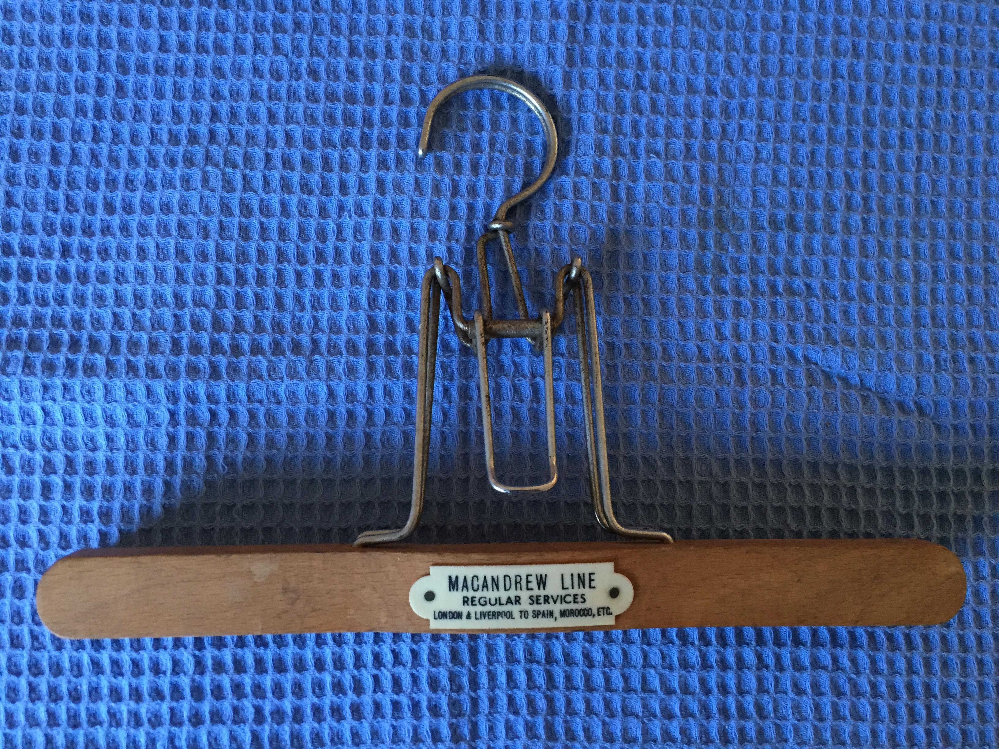 AS USED IN SERVICE COAT HANGER FROM THE MACANDREW LINE