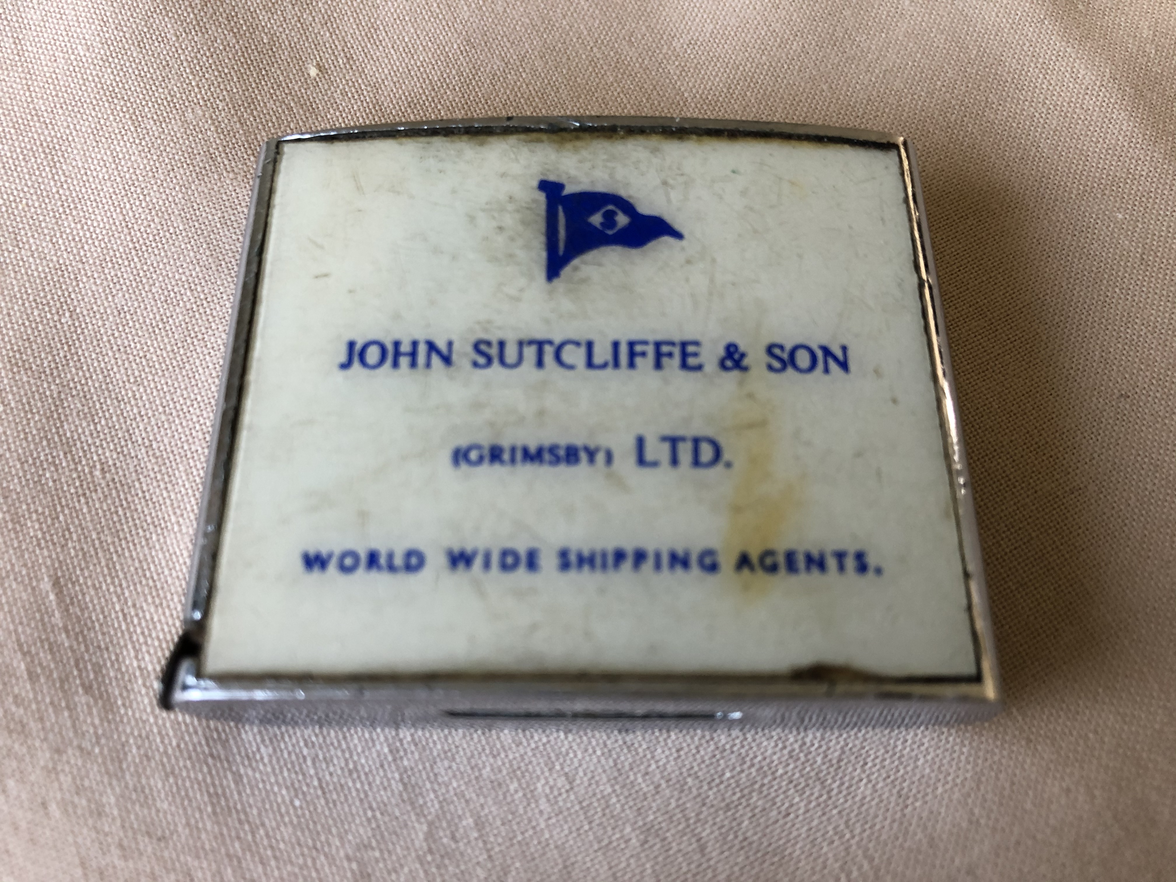 SOUVENIR MINIATURE TAPE MEASURE FROM THE SHIPPING COMPANY JOHN SUTCLIFFE & SON