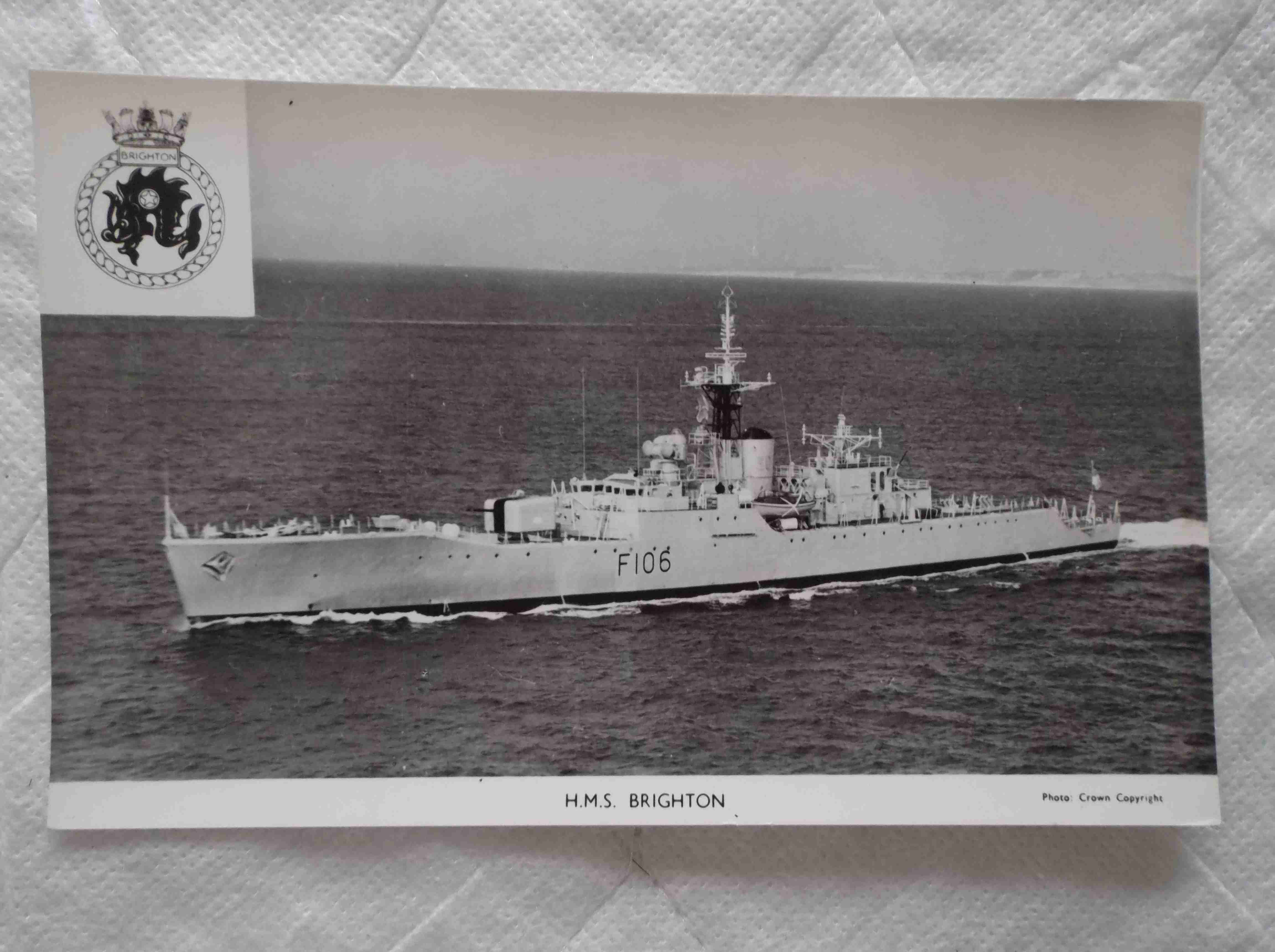 POSTCARD OF THE ROYAL NAVAL VESSEL HMS BRIGHTON