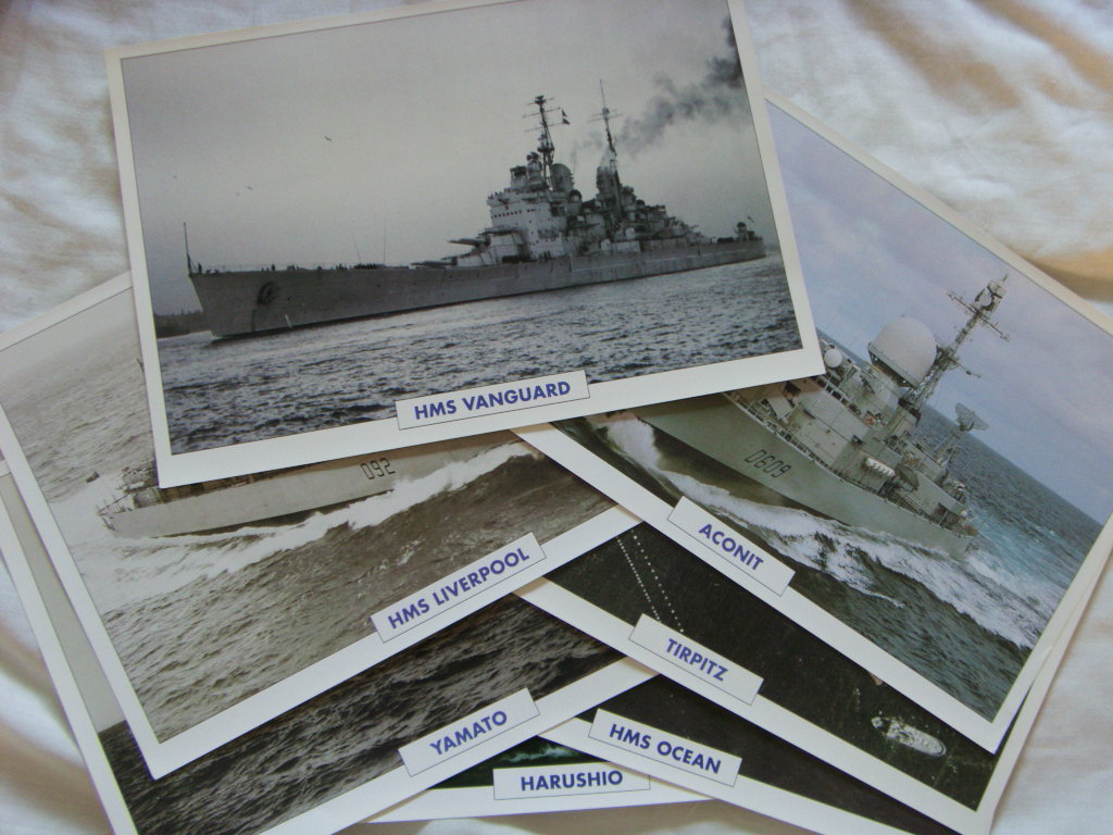 SET OF 7 FULL COLOUR PICTURES OF FAMOUS NAVAL VESSELS WITH FULL DETAILS ON THE REVERSE