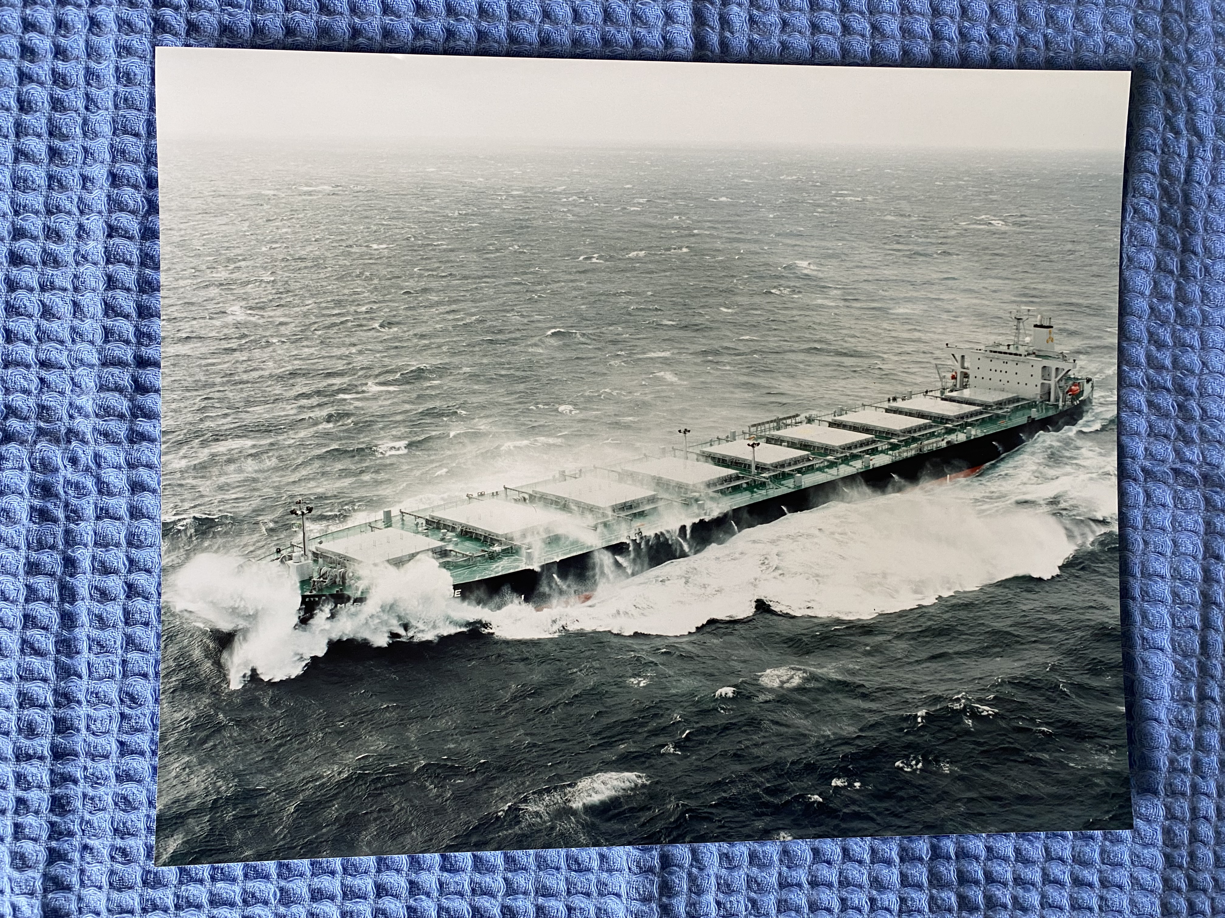 LARGE SIZE COLOUR PHOTOGRAPH OF A CONTAINER VESSEL IN ROUGH SEAS