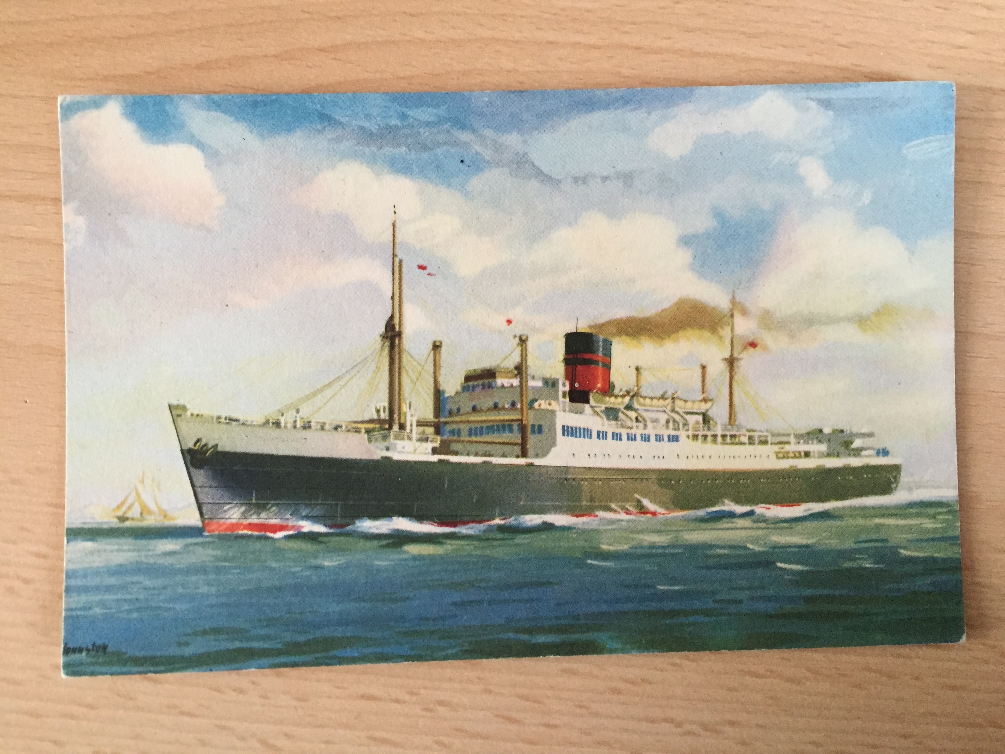 COLOUR POSTCARD OF THE NEW ZEALAND SHIPPING COMPANY VESSEL THE TONGARIRO